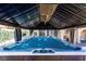 Luxurious hot tub under a gazebo with overhead lighting, providing a relaxing and private outdoor spa experience at 3665 S Pointe Cir, Laughlin, NV 89029
