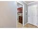 View into the laundry room with custom cabinets and stainless steel sink at 3665 S Pointe Cir, Laughlin, NV 89029