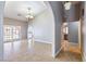 Spacious living room features tile flooring, high ceilings, and lots of natural light at 3665 S Pointe Cir, Laughlin, NV 89029