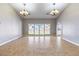 Open-concept living room offering tile flooring, a neutral color palette, and recessed lighting at 3665 S Pointe Cir, Laughlin, NV 89029