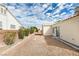 Low-maintenance backyard with desert landscaping and a small patio area is perfect for relaxing at 3721 Brentcove Dr, North Las Vegas, NV 89032