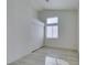 Bright bedroom features wood floors, a large window and a big closet with sliding doors at 3721 Brentcove Dr, North Las Vegas, NV 89032