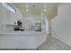 Open concept kitchen featuring bright light, white countertops, and modern appliances at 3721 Brentcove Dr, North Las Vegas, NV 89032