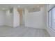 Bright living room boasts sleek floors, recessed lighting, and large windows allowing plenty of natural light at 3721 Brentcove Dr, North Las Vegas, NV 89032