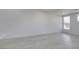 Bright living room features light, wood-look floors, white walls, and windows with natural light at 3721 Brentcove Dr, North Las Vegas, NV 89032