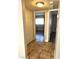 Hallway view with tile flooring leading to an adjacent room at 4260 Vornsand Dr, Las Vegas, NV 89115