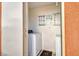 Apartment laundry area with washer and storage at 4260 Vornsand Dr, Las Vegas, NV 89115