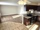 Open floor plan with view of kitchen and living room with hard surface flooring at 4260 Vornsand Dr, Las Vegas, NV 89115