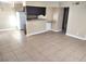 View of the neutral open floor plan and breakfast bar at 4260 Vornsand Dr, Las Vegas, NV 89115