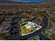 Aerial view of a modern home in a suburban neighborhood with mountain views at 43 Grey Feather Dr, Las Vegas, NV 89135