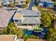 Aerial view of home with pool, covered patio, and manicured landscaping at 43 Grey Feather Dr, Las Vegas, NV 89135