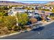 Aerial view of home with mountain views showcasing landscaping and neighborhood at 43 Grey Feather Dr, Las Vegas, NV 89135