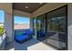 Charming balcony with outdoor seating and views of the surrounding landscape at 43 Grey Feather Dr, Las Vegas, NV 89135