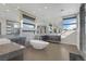 A luxurious bathroom with a freestanding tub and modern fixtures at 43 Grey Feather Dr, Las Vegas, NV 89135