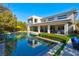 A stunning backyard pool with a modern home in the background at 43 Grey Feather Dr, Las Vegas, NV 89135