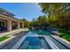 An inviting backyard pool and spa at 43 Grey Feather Dr, Las Vegas, NV 89135