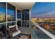 This balcony boasts city views at dusk at 4575 Dean Martin Dr # 2400, Las Vegas, NV 89103