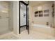 Luxurious bathroom with a soaking tub, walk-in shower, and elegant fixtures at 4575 Dean Martin Dr # 2400, Las Vegas, NV 89103