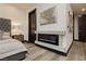 Cozy bedroom corner with a modern fireplace and stylish decor at 4575 Dean Martin Dr # 2400, Las Vegas, NV 89103