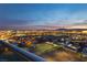 Night view of city skyline and mountains from a high-rise vantage point at 4575 Dean Martin Dr # 2400, Las Vegas, NV 89103