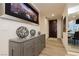 Hallway with modern decor, hardwood floors, and artwork featuring a neutral color palette at 4575 Dean Martin Dr # 2400, Las Vegas, NV 89103