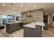 Contemporary kitchen featuring a breakfast bar, sleek countertops, and modern appliances at 4575 Dean Martin Dr # 2400, Las Vegas, NV 89103