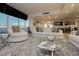 Cozy living room with plush seating, stylish decor, and great natural light at 4575 Dean Martin Dr # 2400, Las Vegas, NV 89103