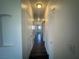 Hallway showcasing interior doors, lighting, and neutral wall colors at 4730 E Craig Rd # 1172, Las Vegas, NV 89115