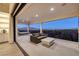 Balcony with sitting area and beautiful views of the city at 48 Augusta Canyon Way, Las Vegas, NV 89141