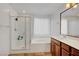 Bright bathroom featuring a glass shower and a combined tub shower at 5465 Buckeye Lake St, Las Vegas, NV 89122