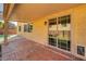 Backyard patio with exterior house view with the sliding door at 58 Desert Castle Ct, Henderson, NV 89012