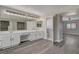 Large bathroom features a double vanity, tiled floors, and a view to the toilet area at 58 Desert Castle Ct, Henderson, NV 89012