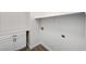Clean laundry room featuring white cabinets, countertop space, and hookups for a washer and dryer at 58 Desert Castle Ct, Henderson, NV 89012
