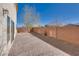 Beautiful backyard featuring pavers, rock landscaping, and a privacy wall at 7203 Pepperbox Ave, Las Vegas, NV 89179