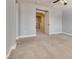 Carpeted bedroom with ceiling fan and a view through the doorway to the landing at 7203 Pepperbox Ave, Las Vegas, NV 89179