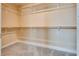 Walk-in closet featuring sturdy shelving and hanging rods for optimal organization of clothing and accessories at 7203 Pepperbox Ave, Las Vegas, NV 89179