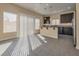 Eat-in kitchen showcasing dark cabinetry, stainless steel appliances and tile flooring at 7203 Pepperbox Ave, Las Vegas, NV 89179