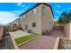 Landscaped backyard includes a patio, artificial turf, and gravel area, perfect for outdoor living and relaxation at 7856 Pyramid Peak St, Las Vegas, NV 89166