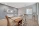 Dining room showcases wood-style floors and tasteful decor, creating an inviting space at 7856 Pyramid Peak St, Las Vegas, NV 89166