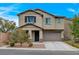 Charming two-story home featuring a two-car garage and well-maintained landscaping at 7856 Pyramid Peak St, Las Vegas, NV 89166