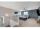 Upstairs living room with plush carpeting, comfortable seating, and a relaxing atmosphere at 7856 Pyramid Peak St, Las Vegas, NV 89166