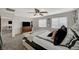This spacious main bedroom features neutral tones, a ceiling fan, and backyard access at 7856 Pyramid Peak St, Las Vegas, NV 89166