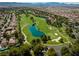 Overhead view of golf course community with lush fairways, serene ponds, and mature trees at 10 Innisbrook Ave, Las Vegas, NV 89113