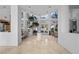 Grand foyer showcasing high ceilings, travertine floors, and abundant natural light from arched windows at 10 Innisbrook Ave, Las Vegas, NV 89113