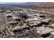 An aerial view of a shopping center with stores, restaurants and ample parking space at 10448 Niagara Falls Ln, Las Vegas, NV 89144