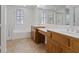 Spacious bathroom featuring dual sinks, generous counter space, tub, and a separate shower at 11428 Belmont Lake Dr # 104, Las Vegas, NV 89135