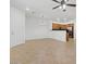 Open dining area with tile flooring, white walls, and a ceiling fan at 11428 Belmont Lake Dr # 104, Las Vegas, NV 89135