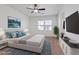 Cozy main bedroom with plush carpet, large windows, and modern decor at 11428 Belmont Lake Dr # 104, Las Vegas, NV 89135