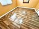 Bedroom featuring laminate flooring and a window, creating a comfortable living space at 1269 Honey Lake St, Las Vegas, NV 89110