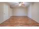 Open bedroom featuring wood floors and multiple closets at 1402 Bareback Ct, Henderson, NV 89014